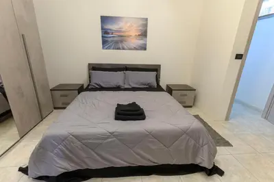 Letto o letti in una camera di Via Figoli Apartment