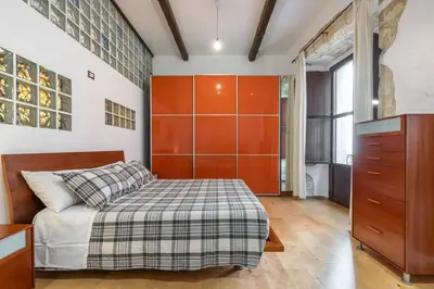 Letto o letti in una camera di Leonida's Home 2 Open Space