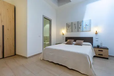 Letto o letti in una camera di Rooms Best Vacation Ever