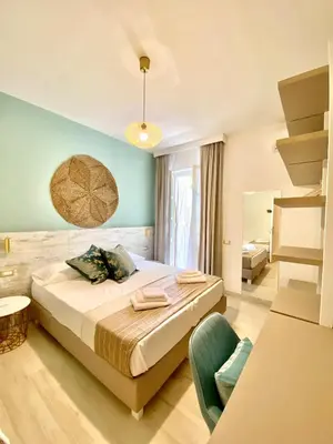 Letto o letti in una camera di Hotel Maison del Sole