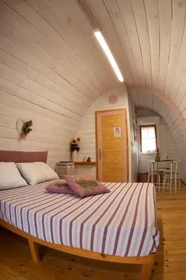 Letto o letti in una camera di B&b Ventuno Barumini