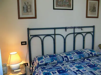 Letto o letti in una camera di Casanoemi 1