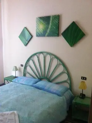 Letto o letti in una camera di Casanoemi 1