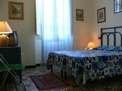 Letto o letti in una camera di Casanoemi 1