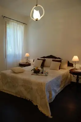 Letto o letti in una camera di Villa le Stelle