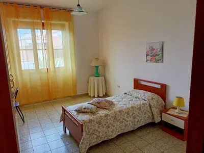 Letto o letti in una camera di Mariangela's Home