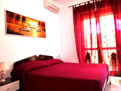 Letto o letti in una camera di HAPPY MARE