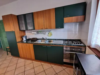 Cucina o angolo cottura di Villetta con giardino in Residence IN CENTRO