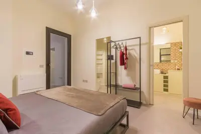 Letto o letti in una camera di Suite Cagliari -99-