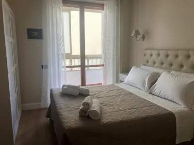 Letto o letti in una camera di GISELLE HOUSE