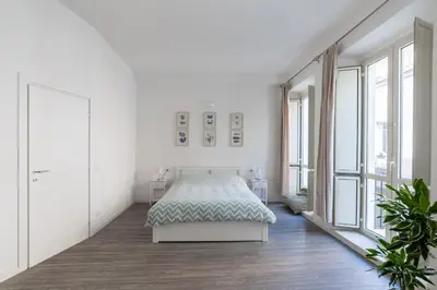 Letto o letti in una camera di Casa Marina Guesthouse Cagliari