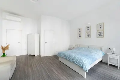 Letto o letti in una camera di Casa Marina Guesthouse Cagliari