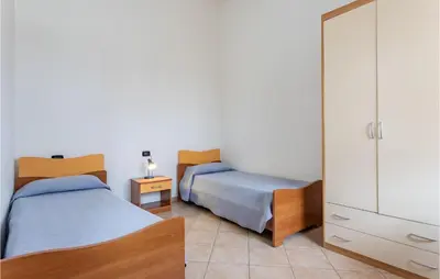 Letto o letti in una camera di Villa 6