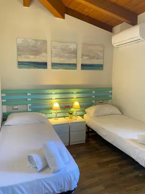 Letto o letti in una camera di La Casa dell Olivo