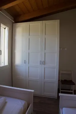 Letto o letti in una camera di La Casa dell Olivo