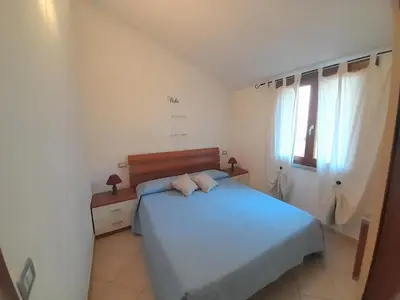Letto o letti in una camera di Nuova valmar I Ginepri 