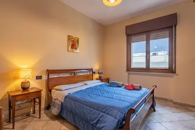 Letto o letti in una camera di ACQUARIO DEI FRALLE