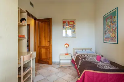 Letto o letti in una camera di ACQUARIO DEI FRALLE