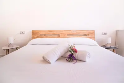 Letto o letti in una camera di B&B le TRE CHIOCCIOLE
