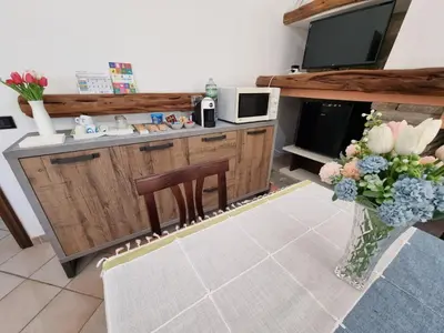 Cucina o angolo cottura di RELAX MAREMONTI Ampia e Panoramica con spaziosa Veranda Attrezzata