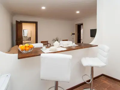 Area soggiorno di Residenze al Castello Apartments