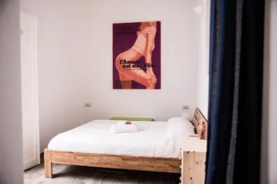 Letto o letti in una camera di la Casa Amaranto