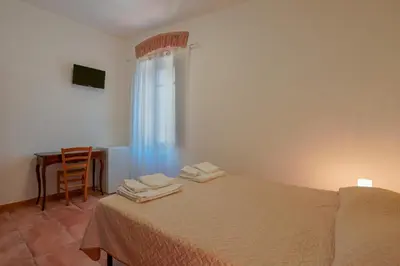 Letto o letti in una camera di La Scala del Sale