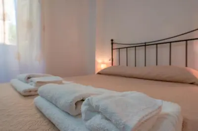 Letto o letti in una camera di La Scala del Sale