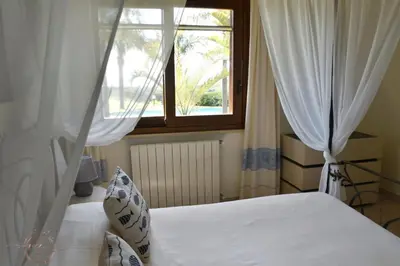 Letto o letti in una camera di Villa Palmetto