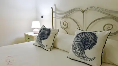 Letto o letti in una camera di Villa Palmetto