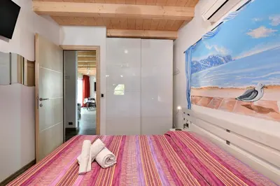 Letto o letti in una camera di Villa Sara