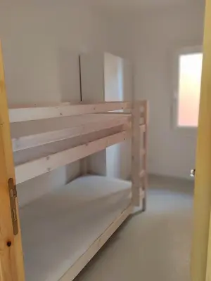 Letto o letti in una camera di Domo Allegru