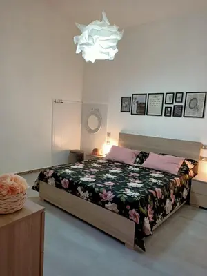 Letto o letti in una camera di Casa Belvedere IUN Q1579