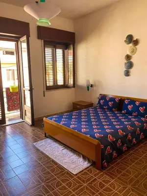 Letto o letti in una camera di Casa Vacanze Sos Vrades