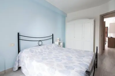 Letto o letti in una camera di Appartamento Lungomare