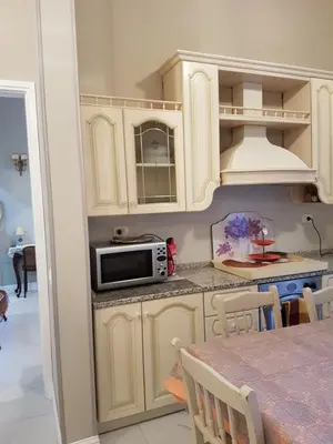 Cucina o angolo cottura di VILLA LIBERTY OFELIA locazioni brevi
