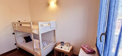Letto o letti in una camera di Ancora Apartment