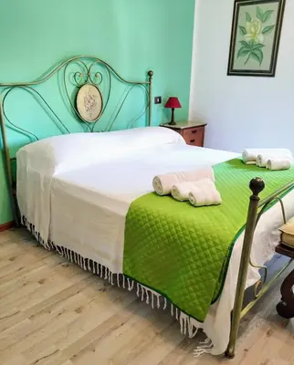 Letto o letti in una camera di Appartamento Margherita