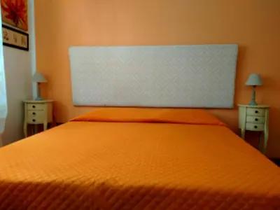 Letto o letti in una camera di Appartamento Margherita