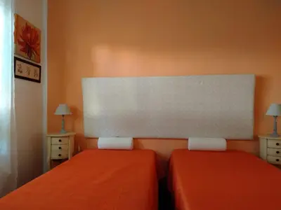 Letto o letti in una camera di Appartamento Margherita