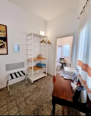 Letto o letti in una camera di Maddrigga di Luna