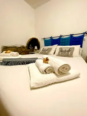 Letto o letti in una camera di Guest House Pimpioxelli Tonnare