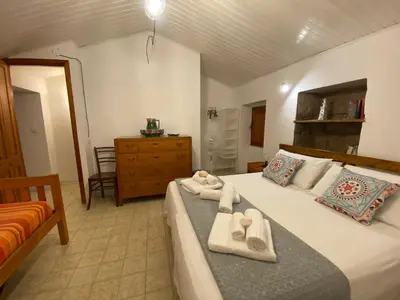 Letto o letti in una camera di Guest House Pimpioxelli Tonnare