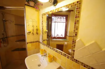 Bagno di Casa De Ajala - B&B de Charme in Antica Dimora totalmente ristrutturata e dotata di tutti i confort Bagni privati Spazio living Patio esterno Ambienti climatizzati Degustazioni prodotti locali