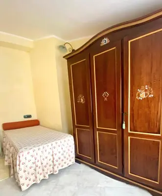 Letto o letti in una camera di Casa De Ajala - B&B de Charme in Antica Dimora totalmente ristrutturata e dotata di tutti i confort Bagni privati Spazio living Patio esterno Ambienti climatizzati Degustazioni prodotti locali