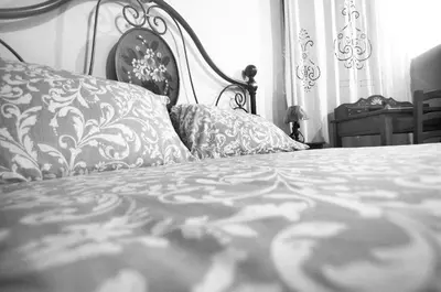 TV o dispositivi per l'intrattenimento presso Casa De Ajala - B&B de Charme in Antica Dimora totalmente ristrutturata e dotata di tutti i confort Bagni privati Spazio living Patio esterno Ambienti climatizzati Degustazioni prodotti locali
