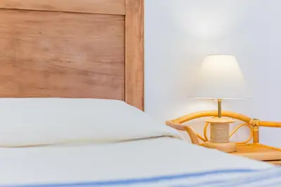 Letto o letti in una camera di Four Rooms
