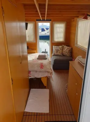 Letto o letti in una camera di HouseBoat Cagliari