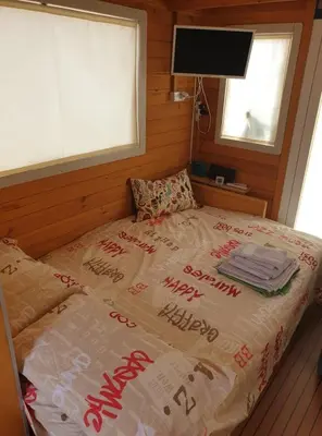 Letto o letti in una camera di HouseBoat Cagliari