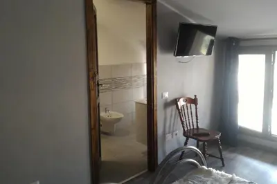 TV o dispositivi per l'intrattenimento presso Corona Bed & Breakfast